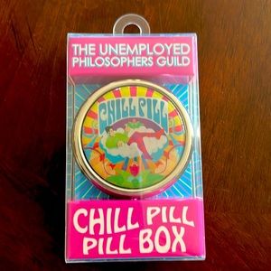 A metal “chill pill” container to hold your meds